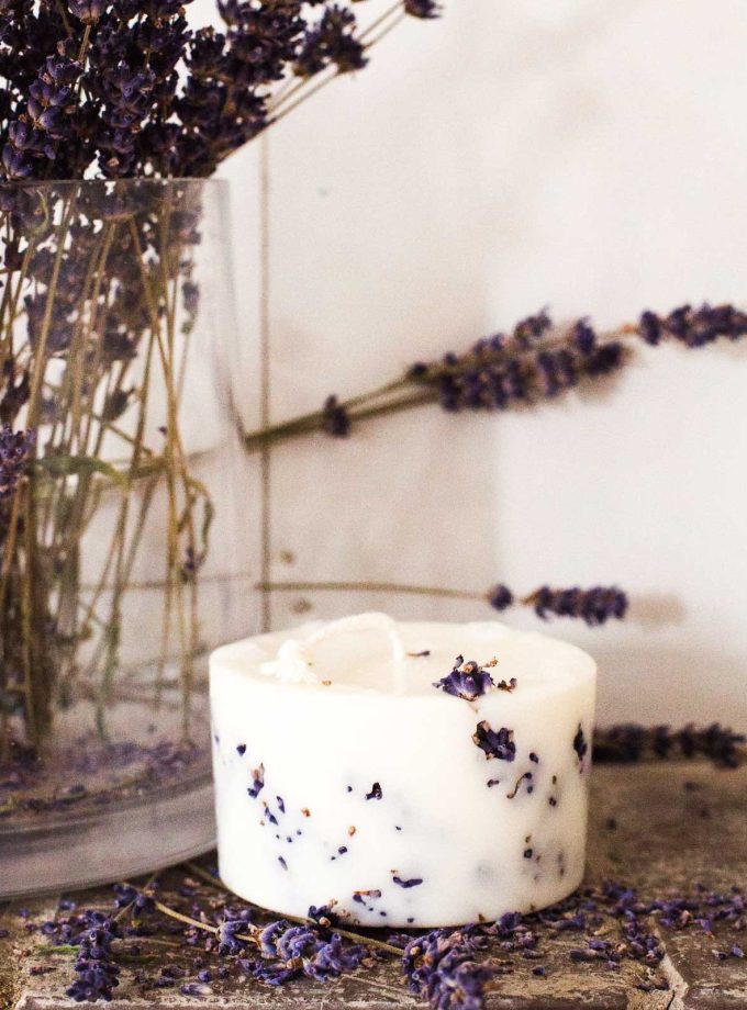 handmade organic rapeseed candle with lavender flowers and lavender essential oil