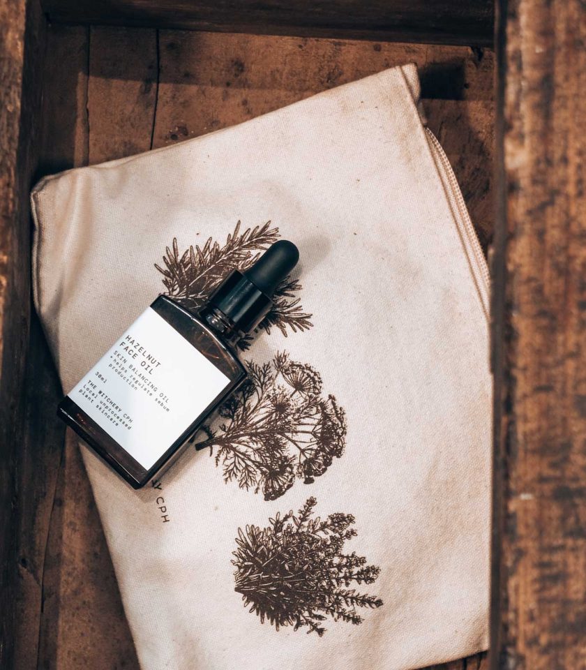 Organic cotton cosmetic pouch with old botanical print of rosemary, thyme and dill
